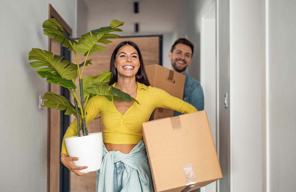 couple with moving boxes